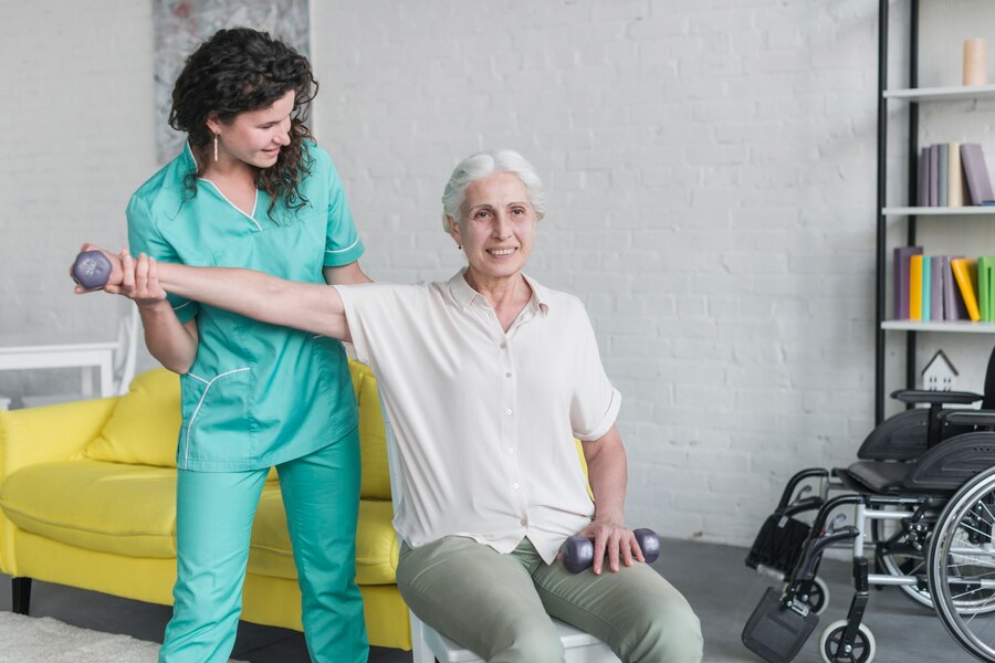 physiotherapist-working-with-elderly-patient-modern-clinic_23-2147861551